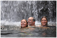 UAn Invigorating Post-hiking Dip Under a Waterfall